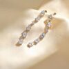 Silver earrings with delicate teardrop design stones