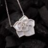 Rose flower necklace with pearl inlay and gemstone accents